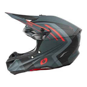Le casque O'NEAL 5SRS Polyacrylite SPIKE a une finition noire mate et grise avec des accents rouges, des motifs géométriques, une visière marquante, des ouvertures d'aération et le logo O'NEAL sur le côté.