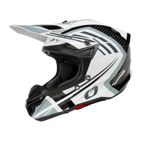 Le casque O'NEAL 5SRS Polyacrylite SPIKE en blanc et noir avec des motifs géométriques accrocheurs dispose d'une grande visière et de trous d'aération. Sur un fond noir, il assure la sécurité avec sa coque en polyacrylite résistante.