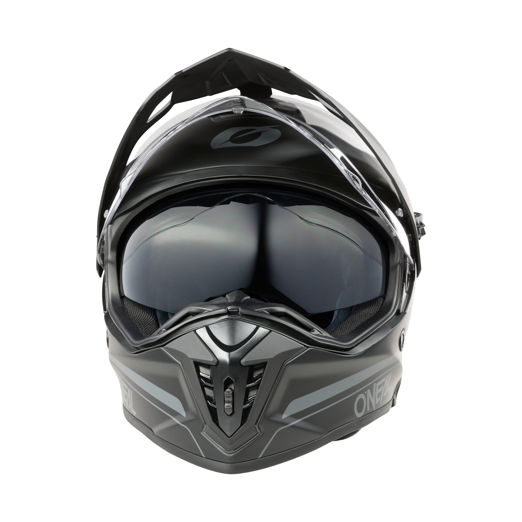 Un O'NEAL A-SRS Helmet SOLID gris mat, un casque de moto en fibre de verre avec une visière claire, des ouvertures d'aération noires, un design anguleux et des fonctions compatibles Bluetooth, est représenté de face sur un fond noir.