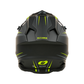 Un casco O'NEAL C-SRS Solid nero con fessure di ventilazione angolari e accenti giallo neon, visto da dietro. La scritta "RCT" e il logo stilizzato sul bordo inferiore offrono la massima sicurezza e un look elegante.