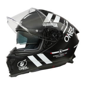 El casco O'NEAL Challenger WARHAWK es un casco integral negro con rayas blancas, los logotipos "ONEAL" y "Carretera Supply Div." y una visera transparente y elevada, ideal para tu próxima salida en bici.