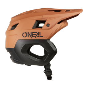 The O'NEAL TRAPPER Helmet SOLID in matt orange and black has a visor, ventilation holes and an adjustable chin strap - ideal as an enduro helmet for mountain bikers. Shown in side profile view.