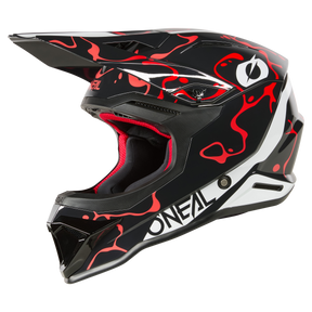 L'O'NEAL 1SRS Helmet SPLASH è un casco da motocross integrale nero con motivi astratti rossi e bianchi, un'ampia visiera, un'imbottitura interna rossa e il logo O'NEAL sul lato.