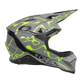 L'O'NEAL 1SRS Helmet SPLASH è un casco da motocross integrale grigio con motivi grafici giallo e verde neon, una visiera appariscente e il marchio O'NEAL sul lato.