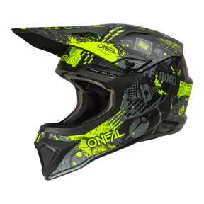 El casco O'NEAL 1SRS VIBRANT es un casco todoterreno negro y gris con gráficos en amarillo neón, motivos geométricos y la inscripción "ONEAL" que destaca en el lateral sobre un fondo negro.