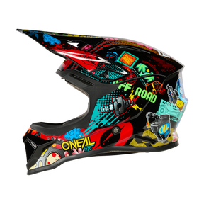 Le casque O'NEAL 1SRS Youth Helmet VIBRANT offre des graphismes accrocheurs et colorés de style cartoon avec du texte, des formes géométriques et des symboles sur fond noir pour un look motocross marquant.