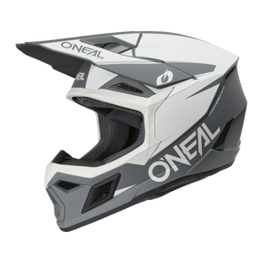 Il casco O'NEAL 3SRS Solid è un casco da motocross bianco e nero con visiera, aperture di ventilazione, mentoniera e marchio "O'NEAL", ideale per la tua prossima avventura nel motocross.