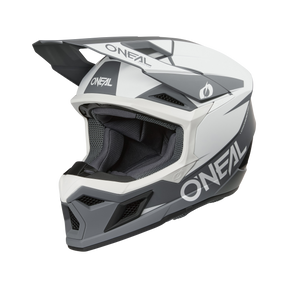 Il casco O'NEAL 3SRS Solid in bianco/nero è un casco da motocross integrale con aperture di ventilazione angolari, una visiera e il logo O'NEAL sui lati e sul davanti per un look elegante e aerodinamico.