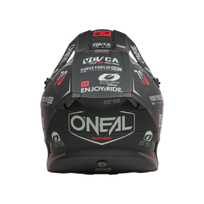 The O'NEAL 5SRS Polyacrylite Helmet BRAND features a matte black back and several white and red sponsor logos, including "ENJOY THE RIDE." and "PURVEYORS OF DIRT". The design is modern and edgy.