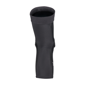 Une genouillère O'NEAL DIRT FLX 1.0 debout en noir avec la technologie Crash Cells et une large bande supérieure est représentée sur un fond blanc sobre.