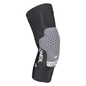 La genouillère O'NEAL DIRT FLX 1.0 en noir et gris dispose de la technologie IPX-Pad Crash Cells avec un coussin de protection perforé, idéal pour le sport ou le vélo, présenté sur un fond blanc simple.
