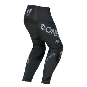 O'NEAL ELEMENT Pants BRAND en noir avec des logos blancs visibles de derrière et de côté sur un fond transparent. Avec des empiècements renforcés et la marque O'NEAL sur les jambes et la ceinture.
