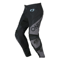 The O'NEAL ELEMENT Pants RACEWEAR in black/grey feature reinforced knee sections, an ergonomic fit and eye-catching O'NEAL branding on the leg.