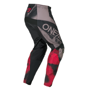 Los pantalones O'NEAL Element ROLLER son unos pantalones de motocross en negro, gris y rojo con un patrón gráfico estructurado y el logotipo O'NEAL en el muslo.
