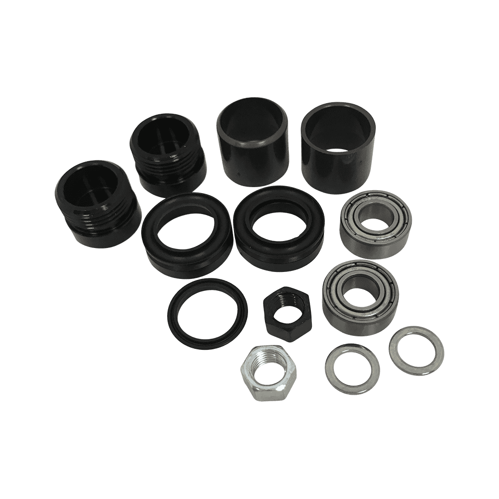 AZONIC Eje Central Instrucción Combo Set Los componentes del pedal Americana, incluidas las piezas cilíndricas negras, los cojinetes metálicos, las tuercas hexagonales y las arandelas, están dispuestos sobre un fondo de color sólido.