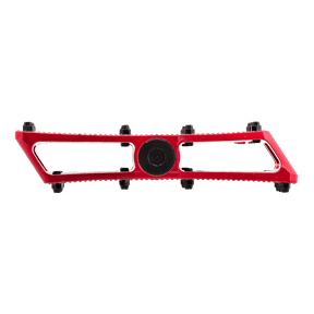 La pédale AZONIC PUCKER UP d'AZONIC est une pédale de vélo rectangulaire rouge avec une partie centrale circulaire noire et six boutons noirs représentés sur un fond transparent.
