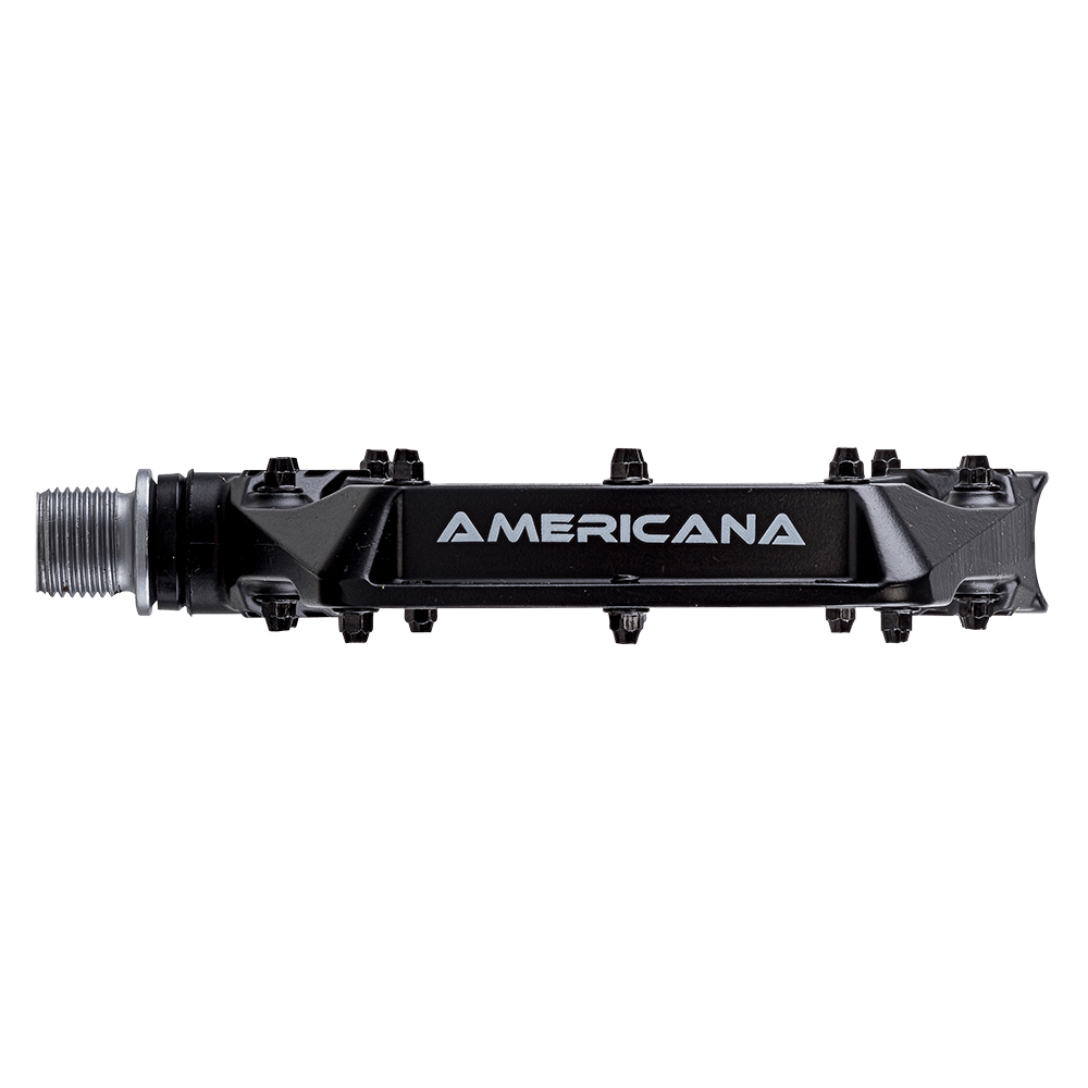 Un pedal AZONIC AMERICANA negro, con el logotipo "AMERICANA" en blanco en el lateral, sobre fondo negro.