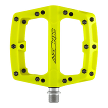 Un pedal AZONIC BLAZE amarillo brillante con clavijas negras y la palabra "AZONIC" en el centro, mostrado desde arriba sobre un fondo transparente.