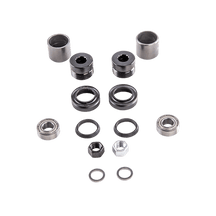 Das AZONIC Central Axle Instruction Combo Set SWITCHBACK von AZONIC zeigt verschiedene mechanische Metallteile - Lager, Unterlegscheiben, Muttern, Buchsen und Dichtungen - in sauberen Reihen auf einem schlichten weißen Hintergrund.