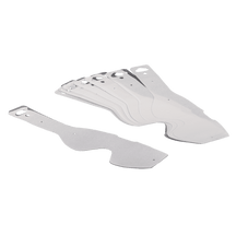 A fanned-out stack of O'NEAL B1 Goggles Tear Off Pack with clear, contoured disposable sheets with die-cut holes, displayed on a solid color background.